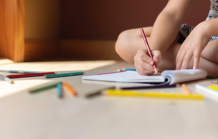 child writing poem.jpeg